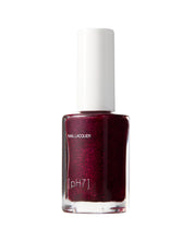 Bottle of dark red nail polish with a white cap on a white background